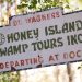 A sign for Dr Wagner's Honey Island Swamp Tours.